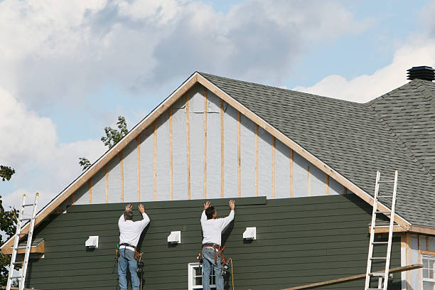 Professional Siding technician working in Falkland, NC